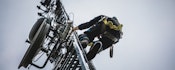 Man climbing a transmission tower