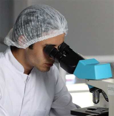 Person using a microscope