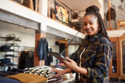 portrait-of-female-owner-of-fashion-store-using-di-2026-01-05-22-54-31-utc